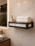 Wall-mounted bathroom storage rack with folded towels in spa-style bathroom