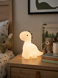 DinoGlow Kids LED Night Light on child's bedside table