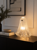 Baroque ghost table lamp on modern sideboard