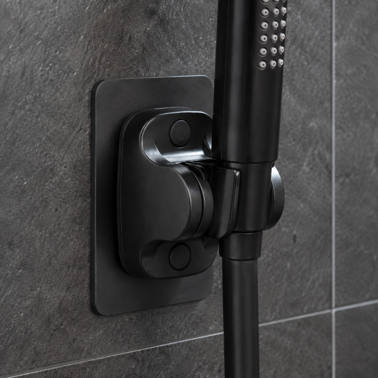Black shower holder installed in a modern bathroom