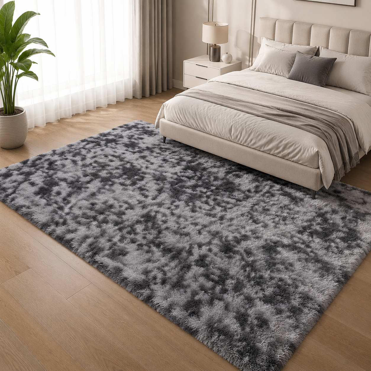 Dark grey tie-dye plush area rug in a modern bedroom